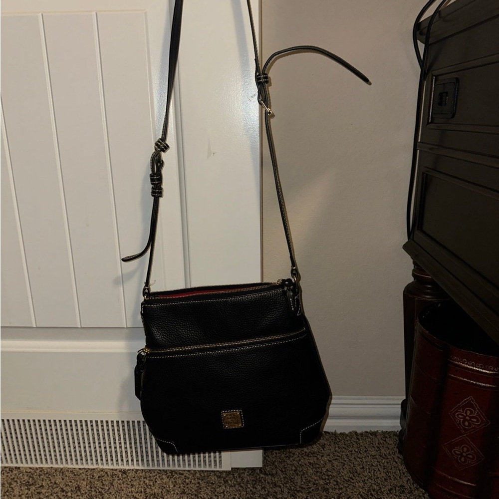 Dooney & Bourke Black Crossbody Bag with Flap-Over Design